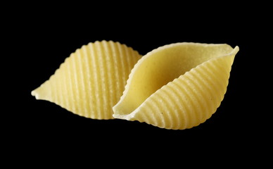 Conchiglie grandi pasta isolated on black background