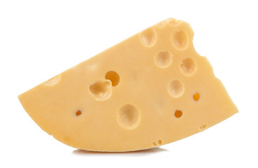 Slice of tasty Maasdam cheese with large holes on a white isolated background. close-up