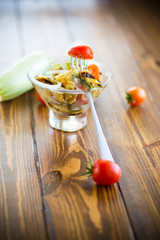 warm grilled zucchini salad with fresh cherry tomatoes and onions