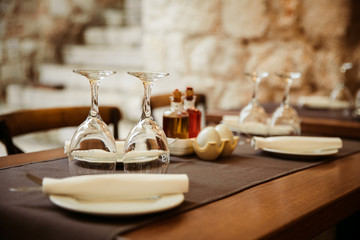 Fototapeta na wymiar glasses on the table of one of the restaurants in bari
