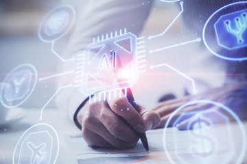 Man in white shirt with technology icons.