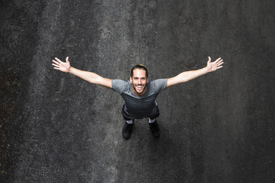 Top View Of Man With Arms Wide Open