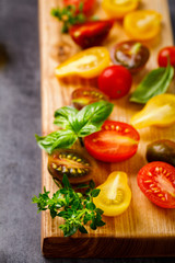 Cherry tomatoes. Summer variety of healthy vegetable colors. Food for Vegetarian.