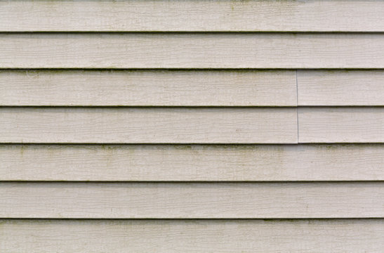 Very Dirty Beige Vinyl Siding