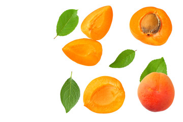 apricot fruits with slices and green leaf isolated on white background. top view