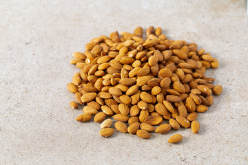 almond nuts on granite background