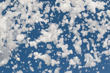 white foam on a blue background