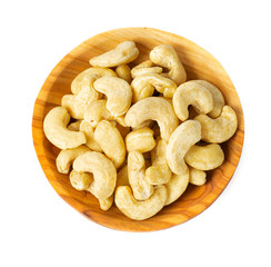 cashew nuts in a bowl isolated on white background