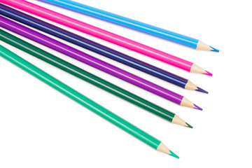 Fototapeta premium Group of six whole colored pencil cold gamma flatlay isolated on white background