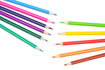 Group of eleven whole colored pencil cold and warm gamma flatlay isolated on white background
