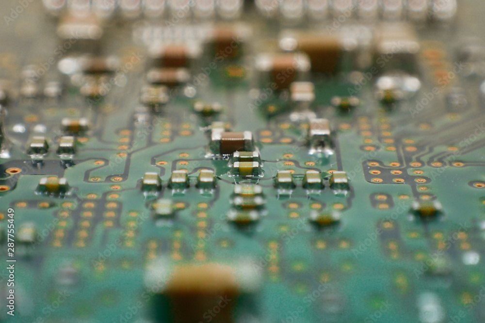 Poster closeup of electronic part with pcb circuit board