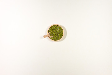 Assortment of beans and lentils in wooden bowl and spoon on clear background. mung bean, groundnut, soybean, red kidney bean , black bean ,red bean and brown pinto beans .