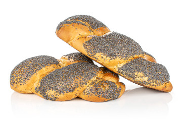 Group of two whole fresh baked twisted poppy seed bun isolated on white background