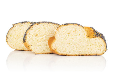 Group of three slices of twisted poppy seed bun in row isolated on white background