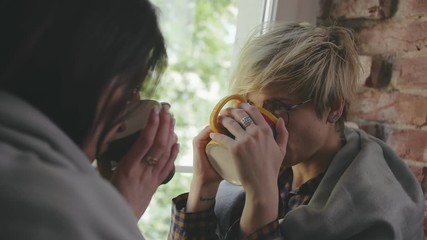 Lesbian couple relaxing together