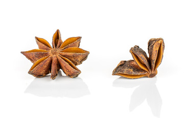 Group of one whole one quarter of dry brown star anise illicium verum isolated on white background