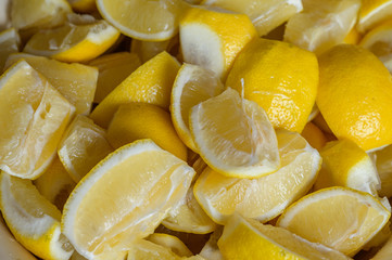 Сhopped lemons slices in home kitchen.