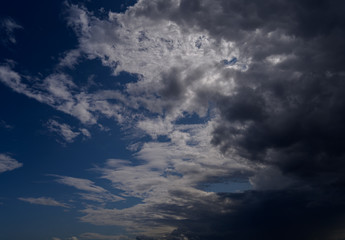 Naklejka na ściany i meble Dramatic sky with clouds. Nature background.