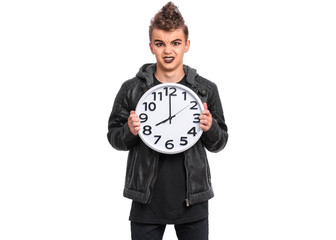 Teen boy student with spooking make-up holds big Clock, isolated on white background. Teenager in...