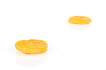 Group of two whole dried orange apricot isolated on white background