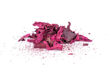 Lot of pieces of dried red beetroot isolated on white background