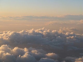 Beautiful and dreamy Clouds and Cloud Formations photographed from above during sunset / dawn