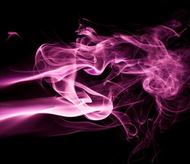 Purple smoke on black background