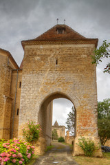 Medieval gatehouse of the Village of Pouylebon in South West France, on one of the four roads to  Santiago de Compostela