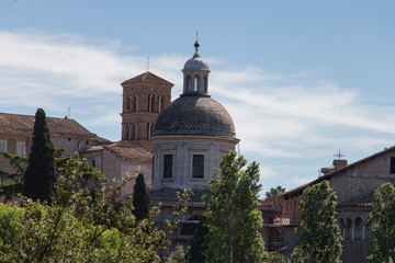 Fototapeta na wymiar Dome and bell tower of Santi Giovanni e Paolo church in Rome, Italy.