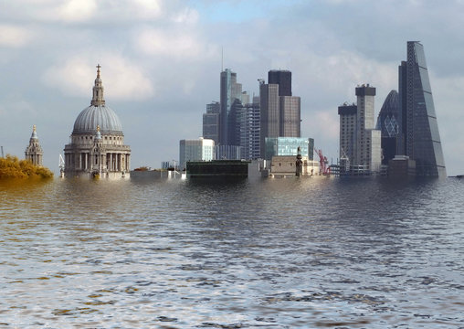 manipulated conceptual image of the city of london with historic buildings flooded due to global warming and rising sea levels