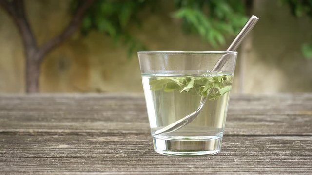 verbena tea on old wooden planks