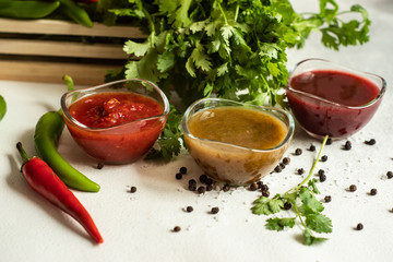 Georgian sauces on stone background