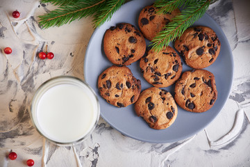 milk and cookies for Santa. holidays, celebration and home concept