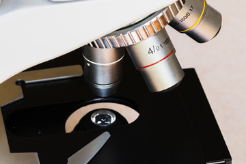 Close up look at a microscope and the lenses.