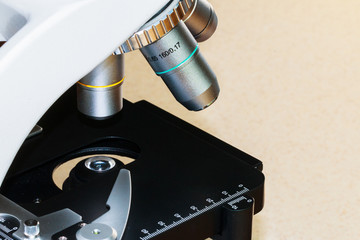 Close up look at a microscope and the lenses.