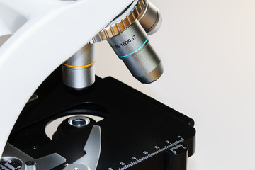 Close up look at a microscope and the lenses.