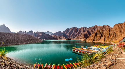 Beautiful Hatta Dam in Dubai place to enjoy weekends water adventure activities amazing mountain scenery of Hatta lake 