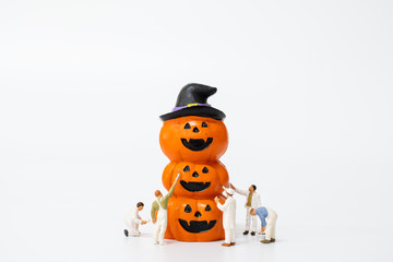 Miniature people coloring Halloween Party Props Decoration on a white background , Halloween party concept