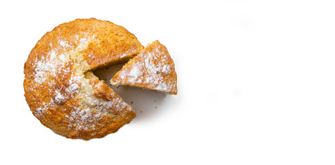 Freshly baked cupcake banner with a cut piece on a white background. Bakery products.