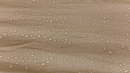 Raindrops on a tent as an abstract background