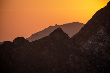 Silhouette of Mountains during Sunrise