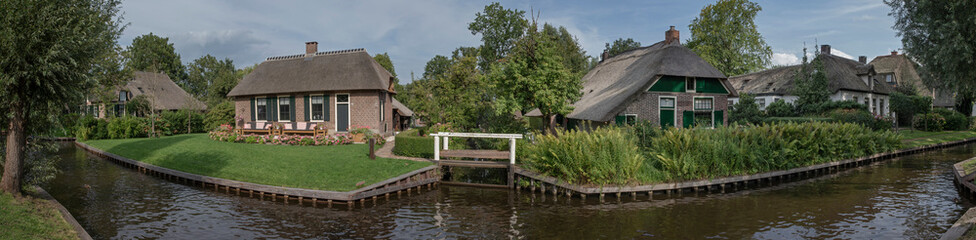 Giethoorn Overijssel Netherlands. Dutch water village. Canals and bridges Panorama