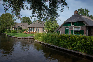 Giethoorn Overijssel Netherlands. Dutch water village. Canals and bridges