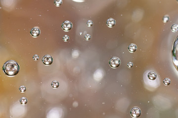 Bubbles of air on the surface of water as an abstract background