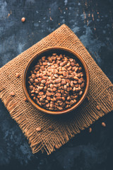 Indian charoly / Buchanania lanzan / Almondette kernel seeds in a bowl or pile. selective focus