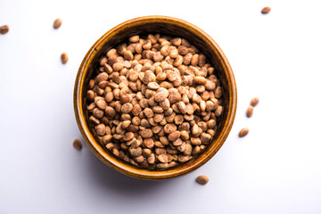 Indian charoly / Buchanania lanzan / Almondette kernel seeds in a bowl or pile. selective focus