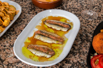 sardine top with sauce, typical Spanish