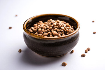 Indian charoly / Buchanania lanzan / Almondette kernel seeds in a bowl or pile. selective focus