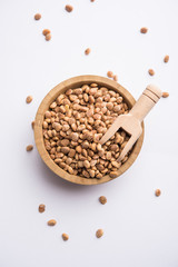 Indian charoly / Buchanania lanzan / Almondette kernel seeds in a bowl or pile. selective focus