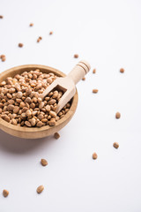 Indian charoly / Buchanania lanzan / Almondette kernel seeds in a bowl or pile. selective focus